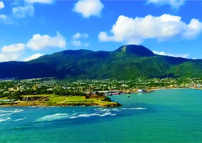 Aerial view of the Puerto Plata coastline with Mount Isabel de Torres rising behind the bay